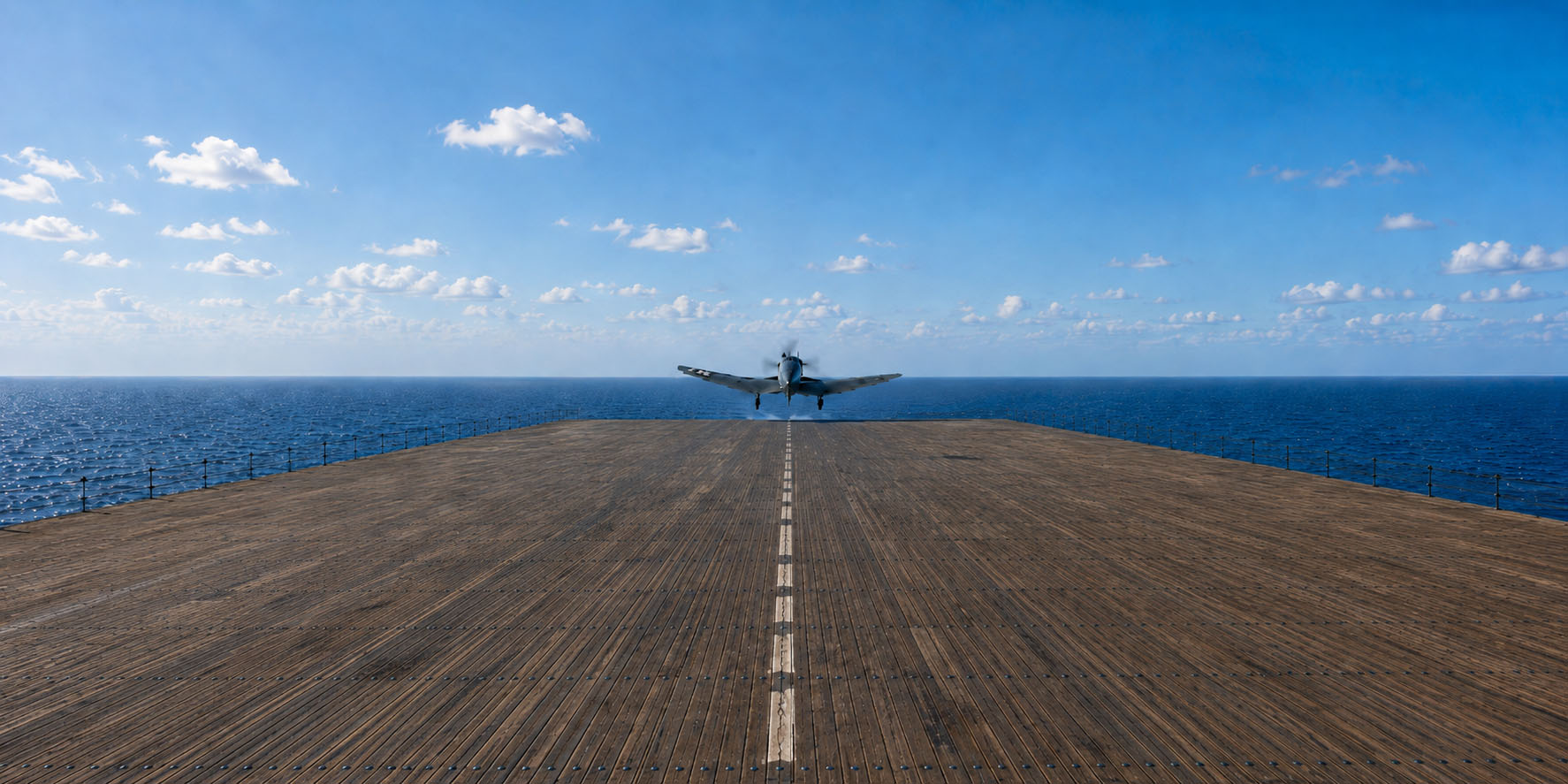 A Corsair approaching an aircraft carrier over the Pacific Ocean